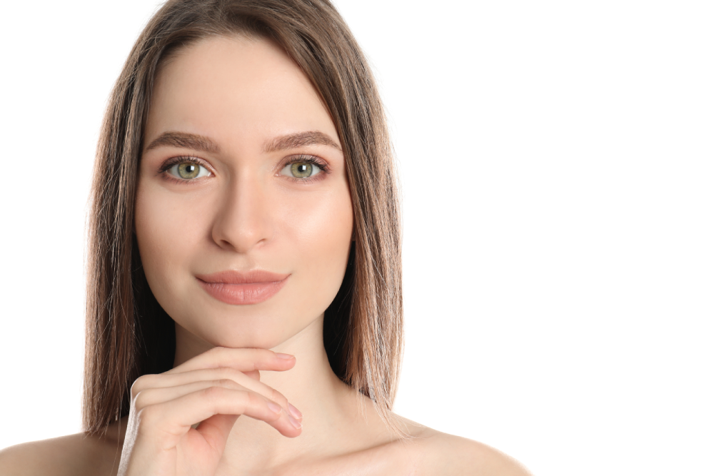 Woman with glowing skin after a med spa treatment.